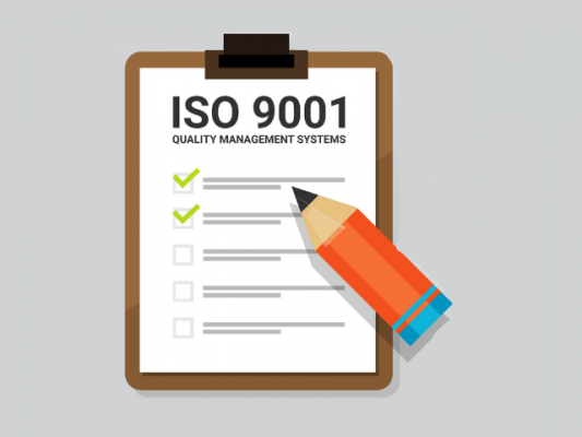 ISO9001 scope checklist with pencil and clipboard